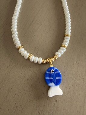 White Freshwater Pearl Necklace with Blue Glass Charm